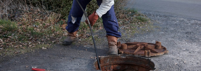 Blocked drains being cleared